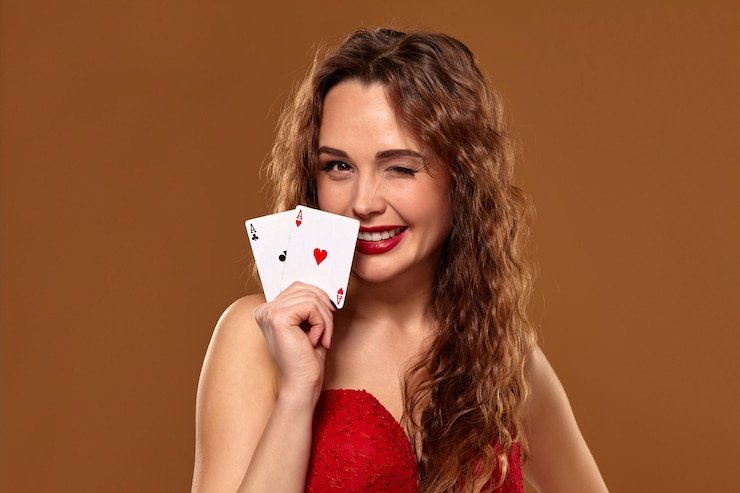 Antarmuka taruhan live blackjack Ganesha Gold menunjukkan chip dan kartu dealer